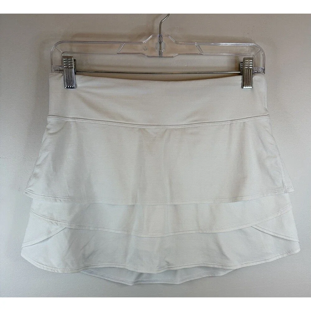 ATHLETA GIRL White Swing Skort XXL/16 Tiered Skirt Pockets Tennis Athletic